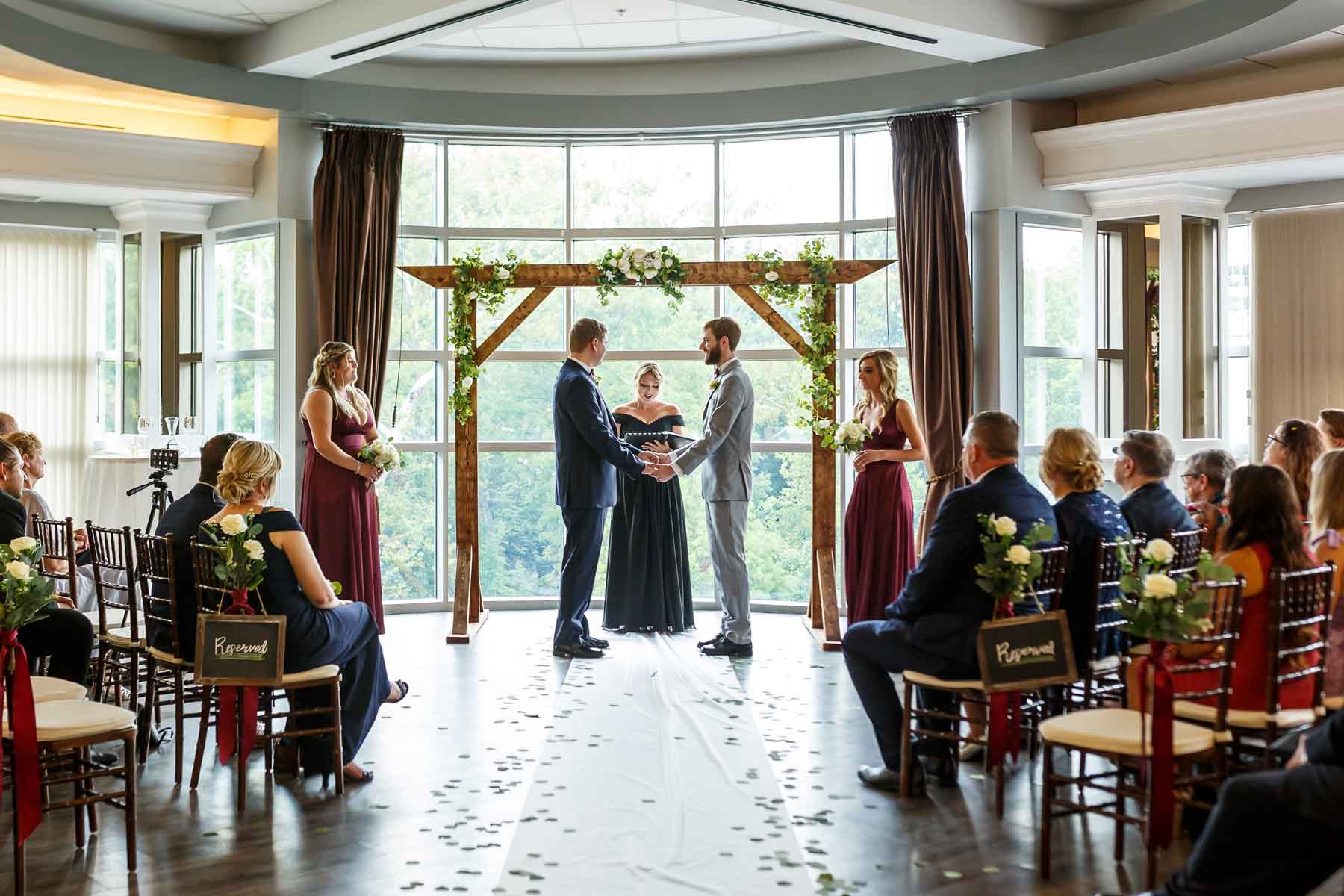 indoor ceremony, photo by Ryan Holland Photography