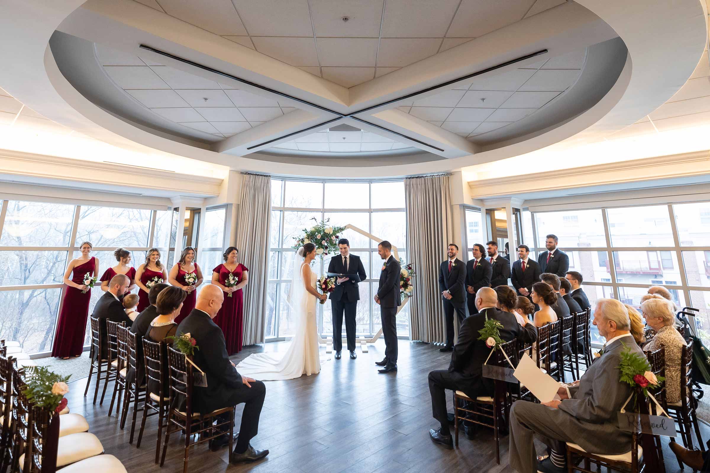 indoor ceremony, photo by Ryan Holland Photography